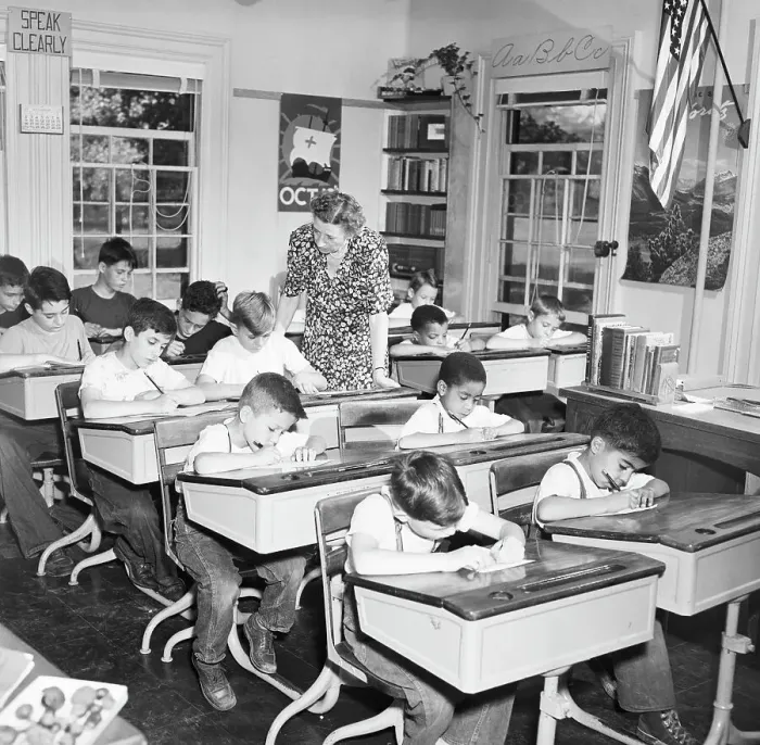 Framed Print : Teacher Supervises Students Taking Quiz at One Room School Framed Print : Teacher Supervises Students Taking Quiz at One Room School