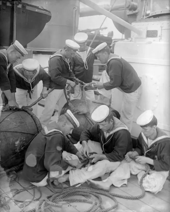 Framed Print : Teamwork. circa 1897: Sailors knotting and splicing rope on board the HMS Repulse Framed Print : Teamwork. circa 1897: Sailors knotting and splicing rope on board the HMS Repulse