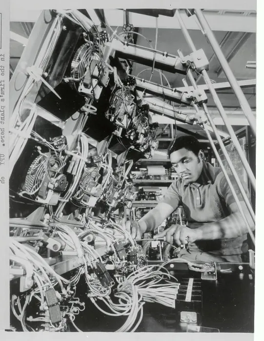 Framed Print : Technician Adjusting Computer Cable Framed Print : Technician Adjusting Computer Cable