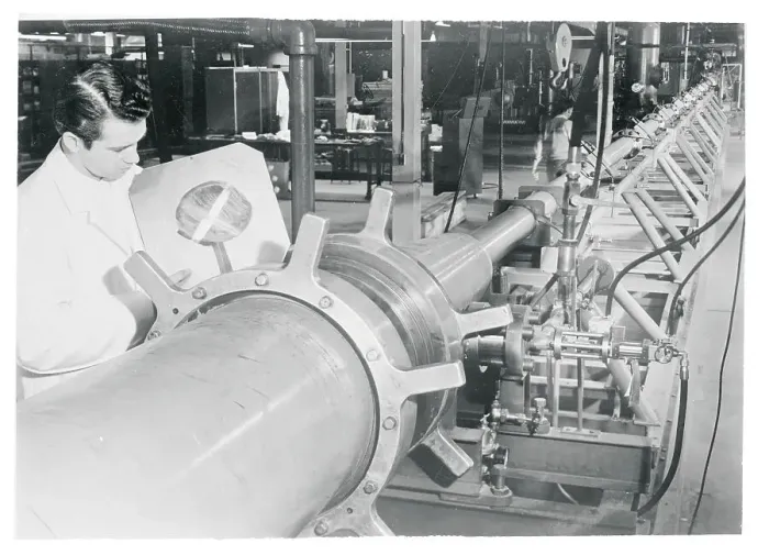 Framed Print : Technician Placing a Steel Diaphragm on a Shock Tube Framed Print : Technician Placing a Steel Diaphragm on a Shock Tube