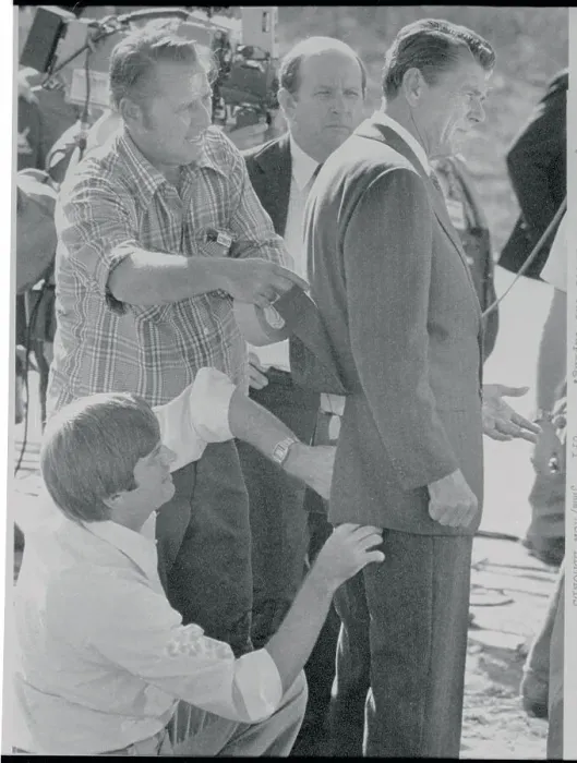 Framed Print : Technicians Adjusting Wire to Ronald Reagan