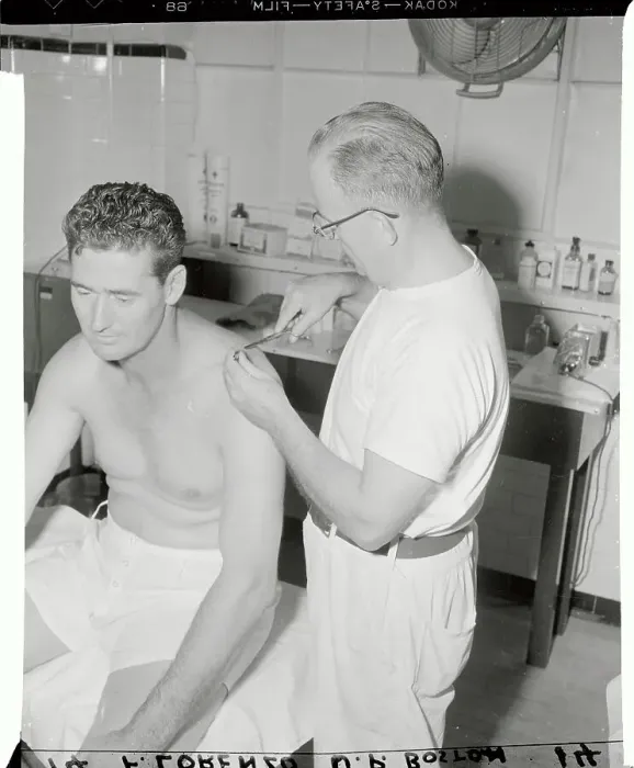 Framed Print : Ted Williams Having His Shoulder Treated by Trainer Framed Print : Ted Williams Having His Shoulder Treated by Trainer