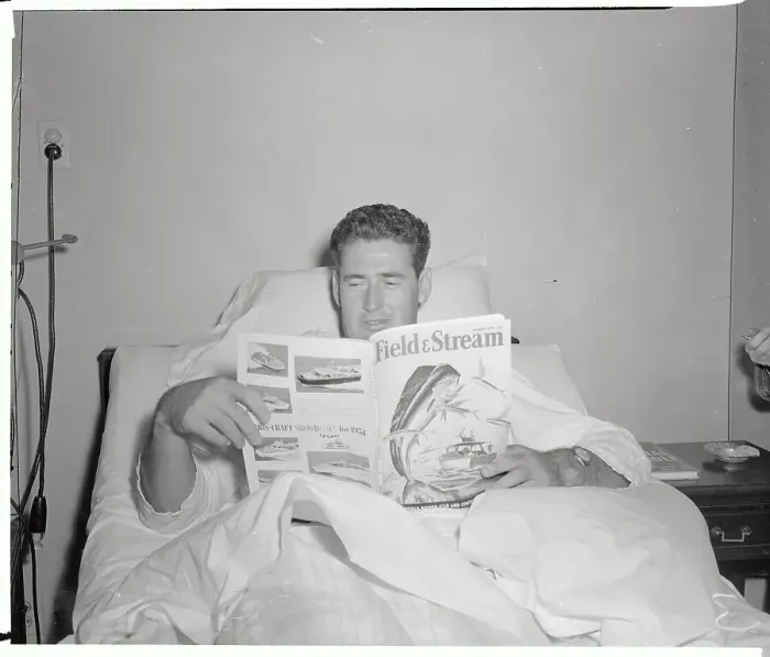 Framed Print : Ted Williams Reading a Magazine Framed Print : Ted Williams Reading a Magazine