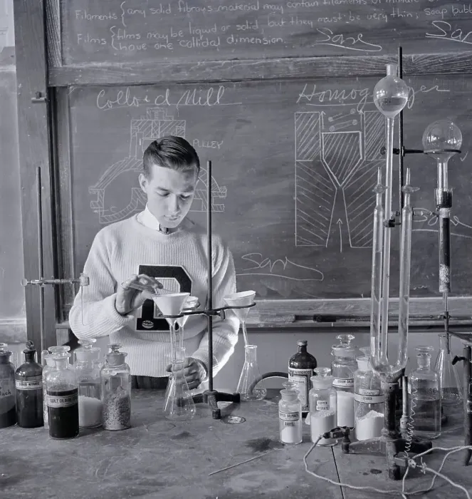 Framed Print : Teen Working on Experiment Framed Print : Teen Working on Experiment