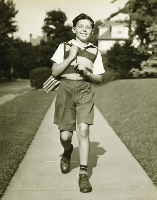 Framed Print : Teenage boy (13-14) going to school, suburbs, (B&W) Framed Print : Teenage boy (13-14) going to school, suburbs, (B&W)