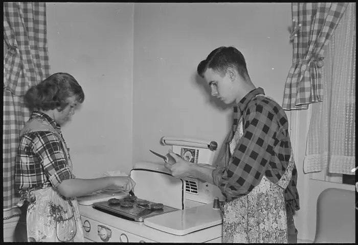 Framed Print : Teenagers Cooking Burgers Framed Print : Teenagers Cooking Burgers