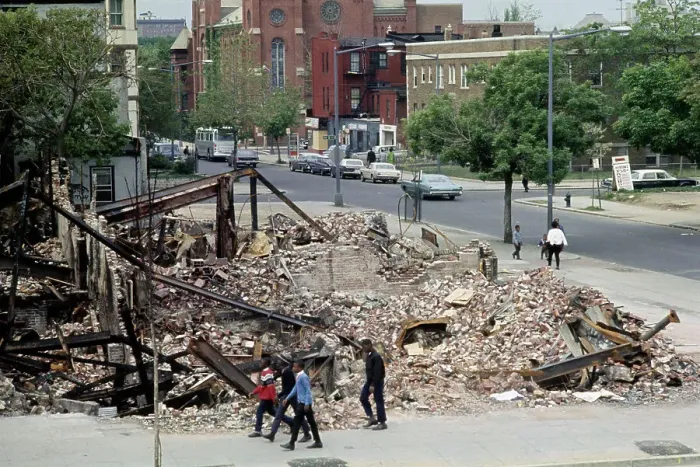 Framed Print : Teens Walking Past Rubble Framed Print : Teens Walking Past Rubble
