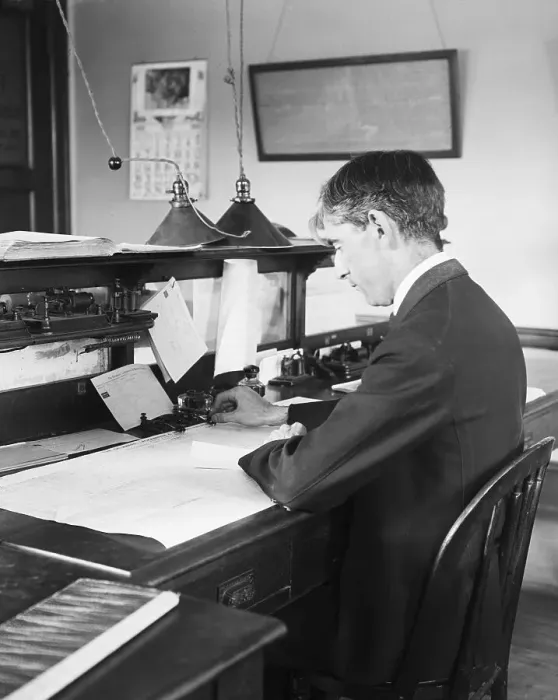 Framed Print : Telegraph Operator Seated At Desk Framed Print : Telegraph Operator Seated At Desk