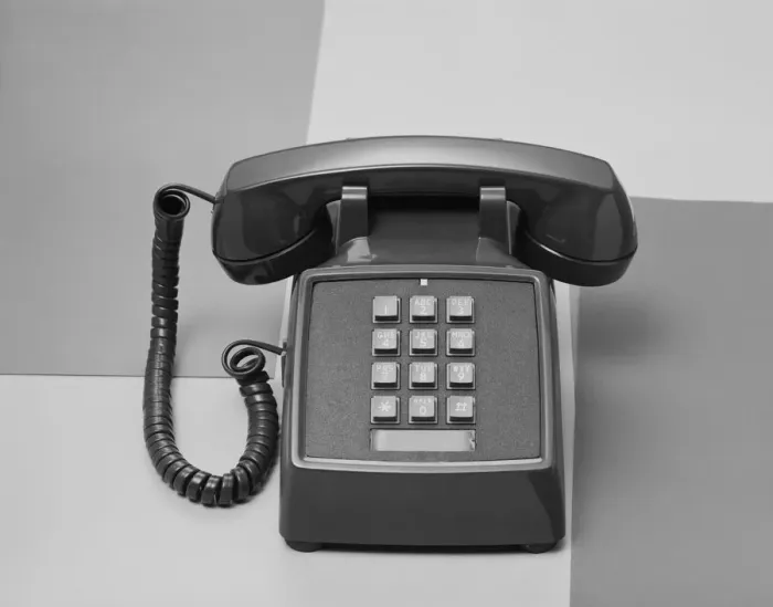 Framed Print : Telephone on white background, close-up Framed Print : Telephone on white background, close-up