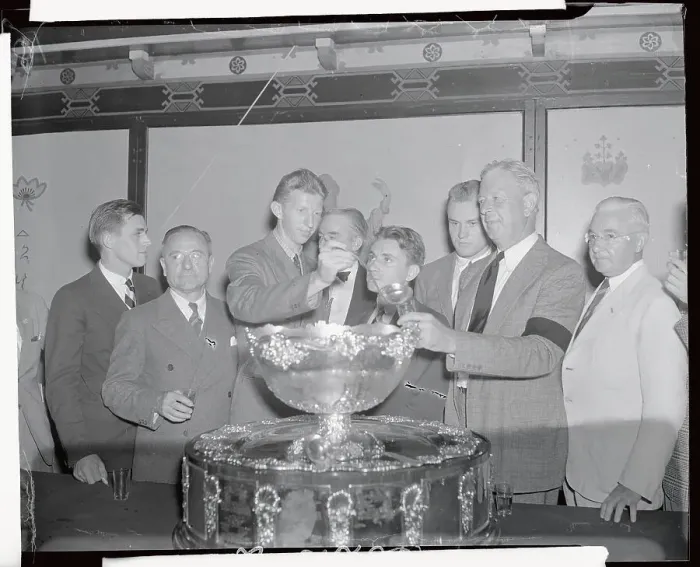 Framed Print : Tennis Professionals Standing over Trophy Framed Print : Tennis Professionals Standing over Trophy