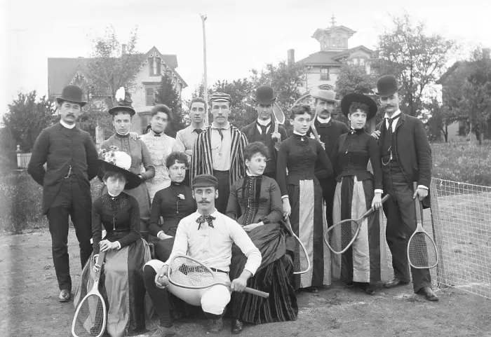 Framed Print : Tennis Team Posing in Front of Homes Framed Print : Tennis Team Posing in Front of Homes