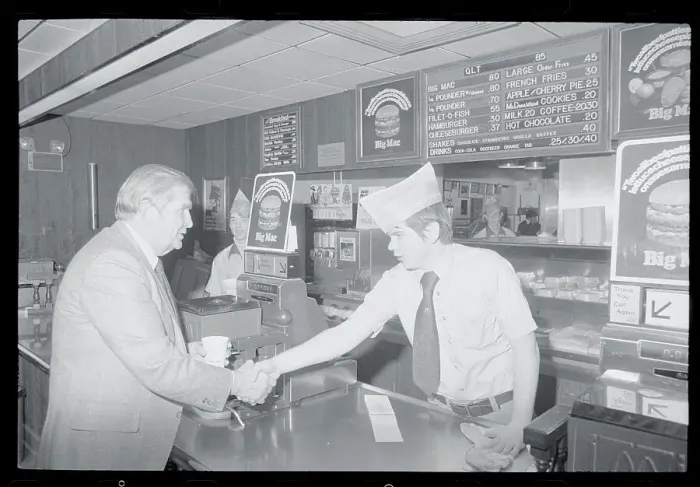 Framed Print : Terry Sanford Shaking Hands with Restaurant Employee Framed Print : Terry Sanford Shaking Hands with Restaurant Employee