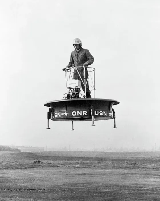 Framed Print : Test Pilot Demonstrating Use of Flying Platform