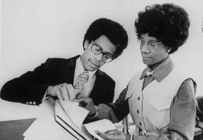 Framed Print : Thaddeus Garrett Showing Shirley Chisholm a Report Framed Print : Thaddeus Garrett Showing Shirley Chisholm a Report