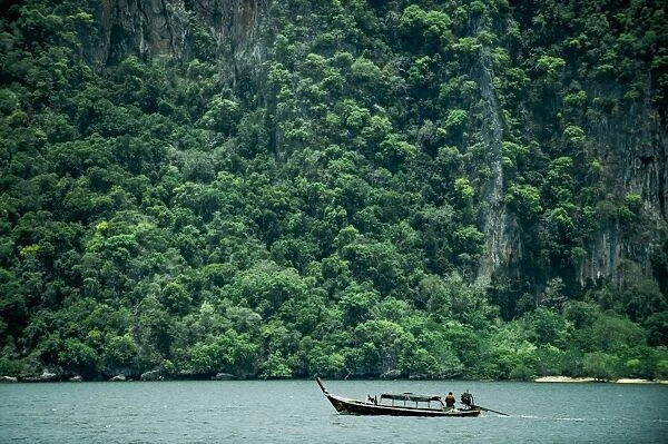 Thai local boat over Andaman sea
