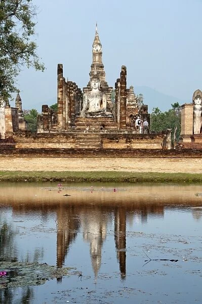 Thailand, Siam archaeological Park, Sukhothai, Wat Mahatha, View of Buddha statue