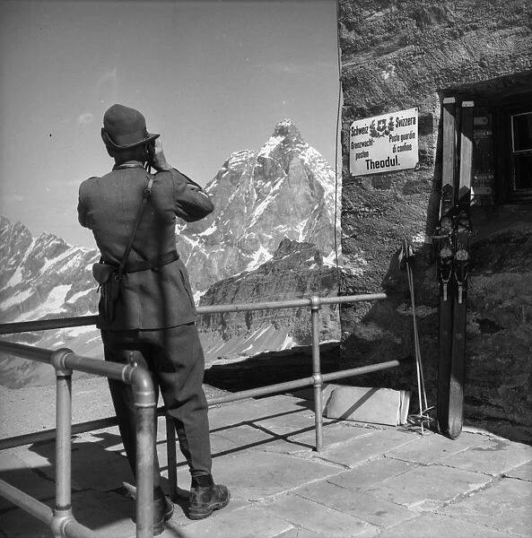 Theodul. circa 1955: A sentry guards the highest Swiss border control post at Theodul