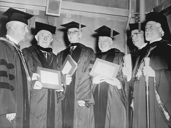 Framed Print : Theology Degree Recipients in Caps and Gowns Framed Print : Theology Degree Recipients in Caps and Gowns