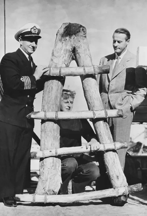 Framed Print : Thor Heyerdahl with Son Posing with Wooden Sledge Framed Print : Thor Heyerdahl with Son Posing with Wooden Sledge