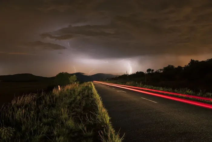Framed Print : A thunderstorm at night with lightning on a remote road in the Cradle of Humankind, Magaliesburg, Gauteng Province, South Africa Framed Print : A thunderstorm at night with lightning on a remote road in the Cradle of Humankind, Magaliesburg, Gauteng Province, South Africa