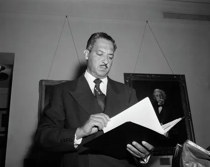 Framed Print : Thurgood Marshall Holding Book