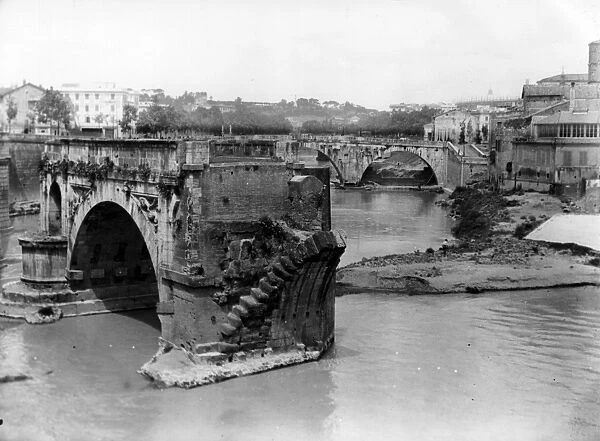 The Tiber. circa 1950: A section of the Tiber river in Rome with the remains