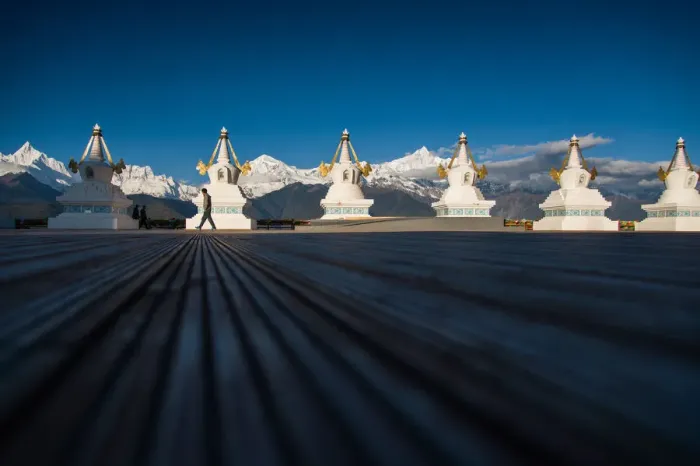 Framed Print : Tibetan stupas and the snow mountain