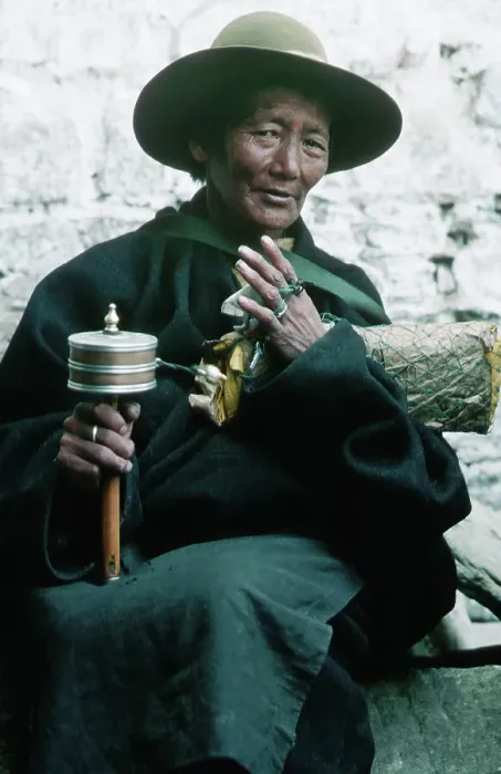 Framed Print : Tibetan Woman Spinning Prayer Wheel Framed Print : Tibetan Woman Spinning Prayer Wheel