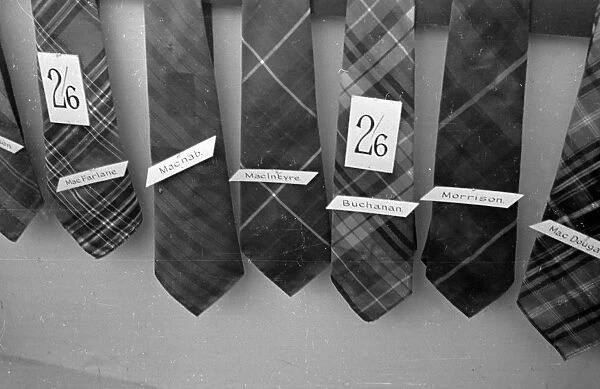 Tie Shop. 15th October 1938: Tartan ties belonging to various Scottish