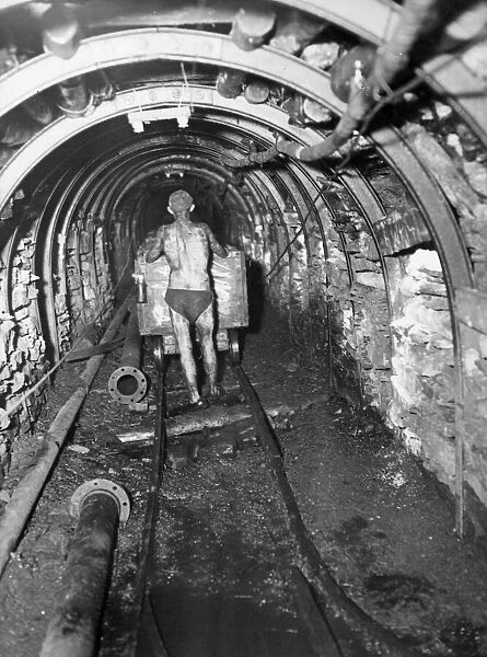 Under Tilmanstone. A miner working underground in Tilmanstone Colliery, in Kent
