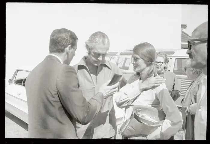Framed Print : Timothy Leary and Wife Being Greeted by Police Detective Framed Print : Timothy Leary and Wife Being Greeted by Police Detective