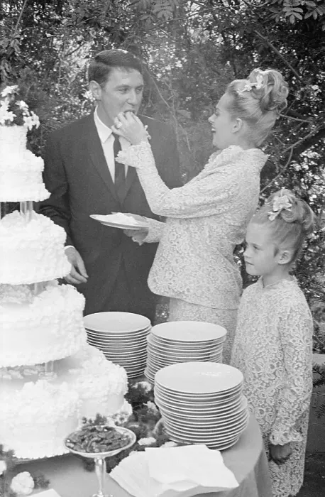 Framed Print : Tippi Hedren Feeding Her Husband Cake Framed Print : Tippi Hedren Feeding Her Husband Cake