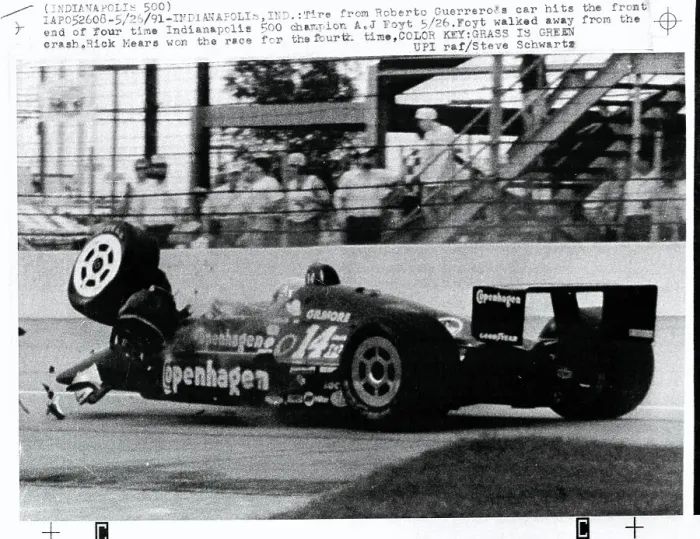 Framed Print : Tire Hits Front of A.J. Foyt's Racing Car Framed Print : Tire Hits Front of A.J. Foyt's Racing Car
