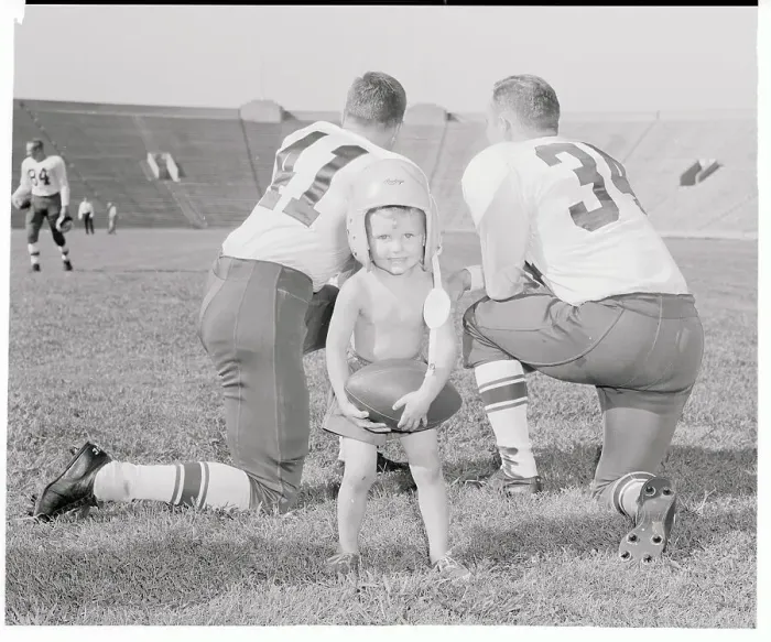 Framed Print : Toddler with Football Helmet Framed Print : Toddler with Football Helmet