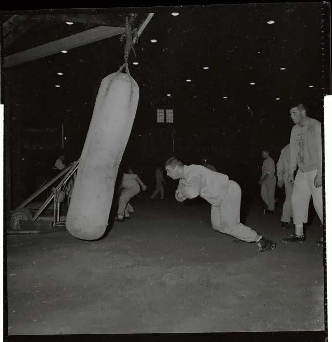 Framed Print : Tom Brown Hitting Bags