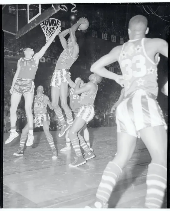 Framed Print : Tom Gola Trying to Block a Shot