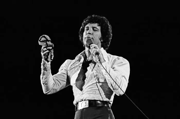 Framed Print : Tom Jones. ATLANTA - SEPTEMBER 16: Welsh singer Tom Jones holds some women's Framed Print : Tom Jones. ATLANTA - SEPTEMBER 16: Welsh singer Tom Jones holds some women's