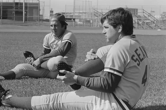 Framed Print : Tom Seaver and Johnny Bench Sitting on Grass and Exercising Framed Print : Tom Seaver and Johnny Bench Sitting on Grass and Exercising