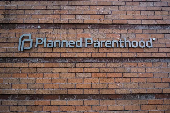 Framed Print : Bill Tompkins Planned Parenthood signage Archive