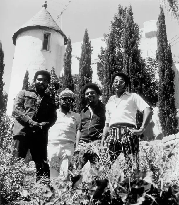 Framed Print : Four Tops Portrait With A Windmill