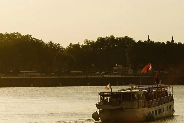 Tourboat in a river, Garonne River, Bordeaux, Aquitaine, France