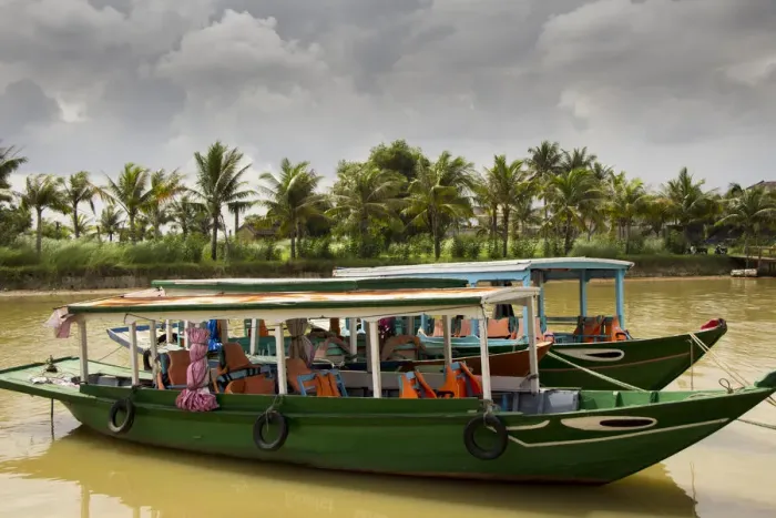 Framed Print : Tourist boats moored on bank of Thu Bon River Framed Print : Tourist boats moored on bank of Thu Bon River