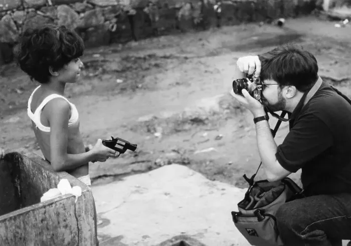 Framed Print : A Tourist Photographs a Small Girl Framed Print : A Tourist Photographs a Small Girl
