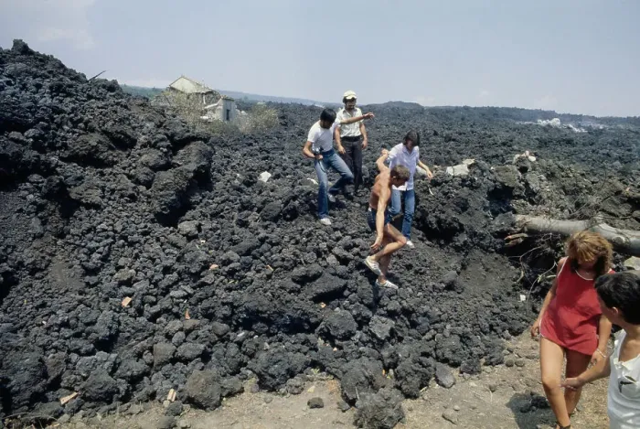 Framed Print : Tourists Walking Over Lava Rock Framed Print : Tourists Walking Over Lava Rock