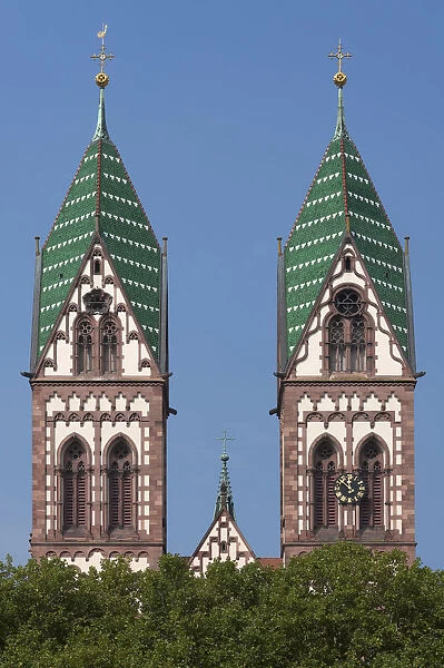 Towers of the Herz Jesu-Kirche, or Sacred Heart Church, built in the style of Historicism, consecrated in 1897, Freiburg, Baden-Wurttemberg, Germany