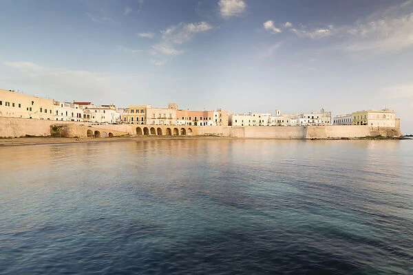 Town beach and historic centre in the evening light, Gulf of Taranto, Gallipoli, Province of Lecce, Apulia, Italy