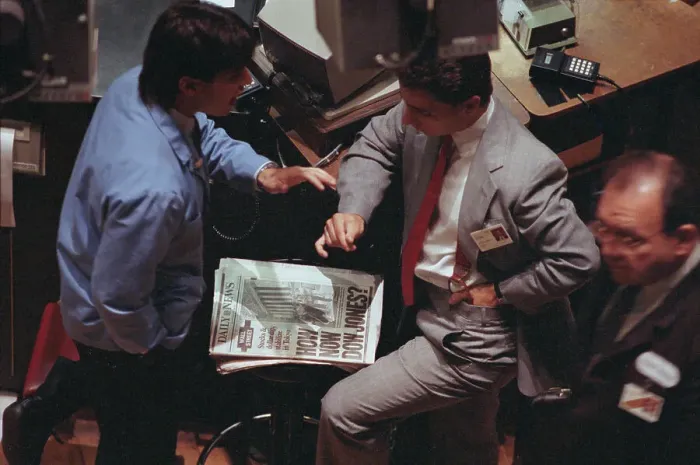 Framed Print : Traders Reading Newspaper Framed Print : Traders Reading Newspaper