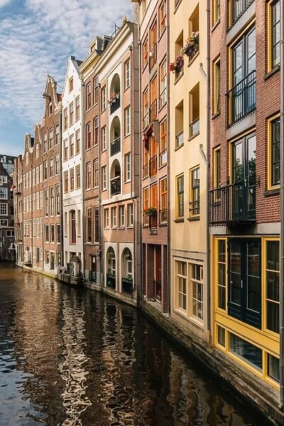 Traditional Dutch houses along the canal in Amsterdam, Netherlands