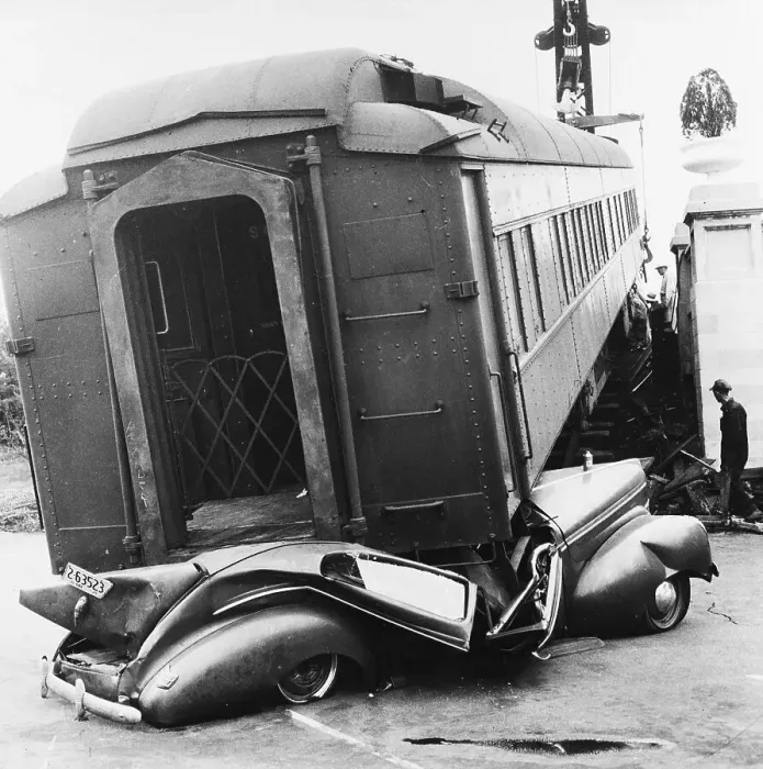 Framed Print : Train Car Resting on Automobile After Accident Framed Print : Train Car Resting on Automobile After Accident
