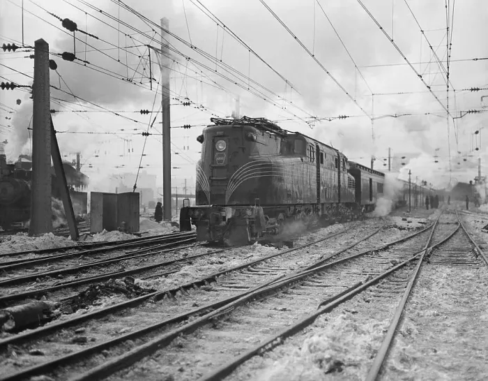 Framed Print : A Train Riding Along an Electric Railroad Framed Print : A Train Riding Along an Electric Railroad